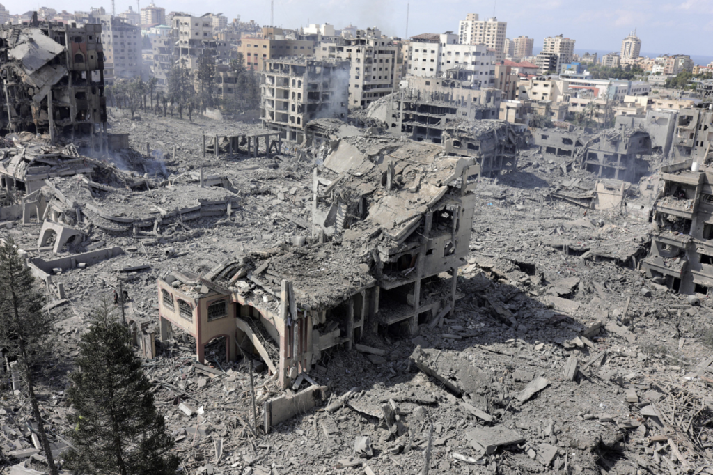 Massive destruction is seen in Al-Rimal popular district of Gaza City after it was targeted by airstrikes carried out by Israeli forces, October 10, 2023. (Mohammed Zaanoun:Activestills)