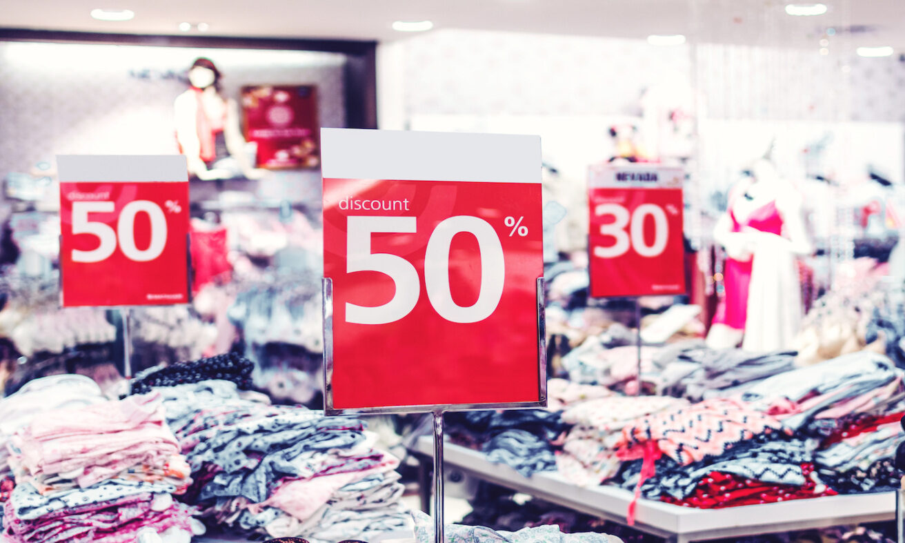 Discount red sign board in the store. Free public domain CC0 photo.More:  Original public domain image from Flickr